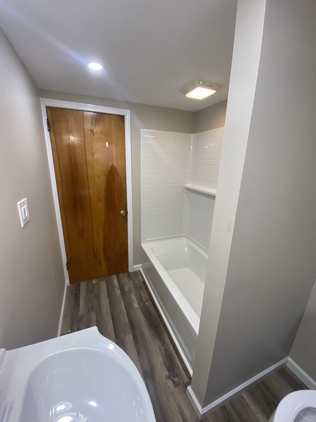 Bathroom with updated plumbing and sub floor by BRM