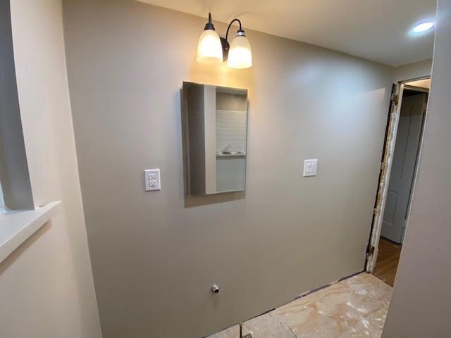 Bathroom with fresh electrical switches and lights