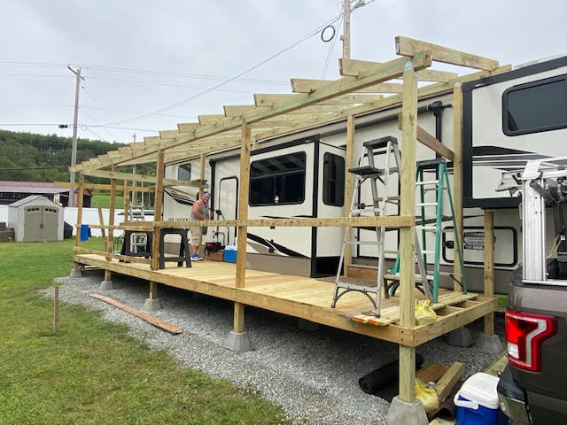 Custom covered wood deck for the RV