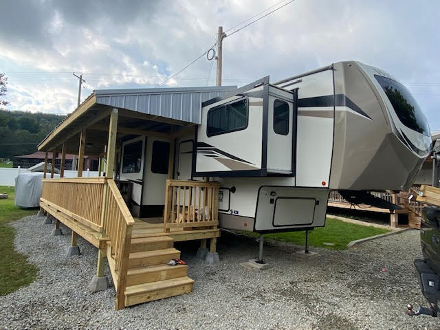 Custom covered wood deck for the RV