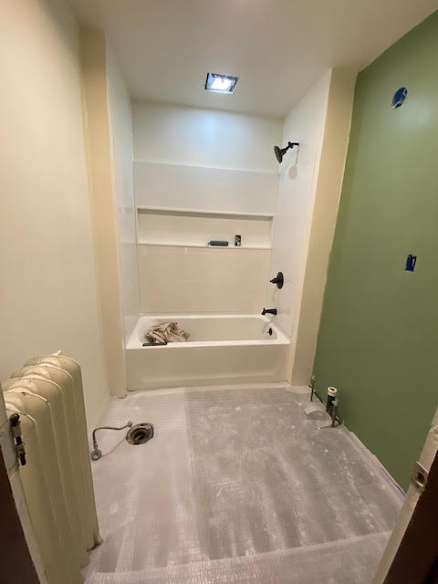 Floor and toilet install with some painting