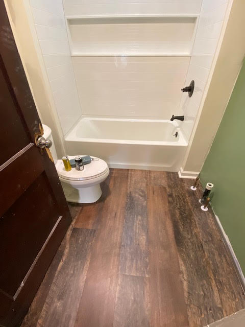 Floor and toilet install with some painting