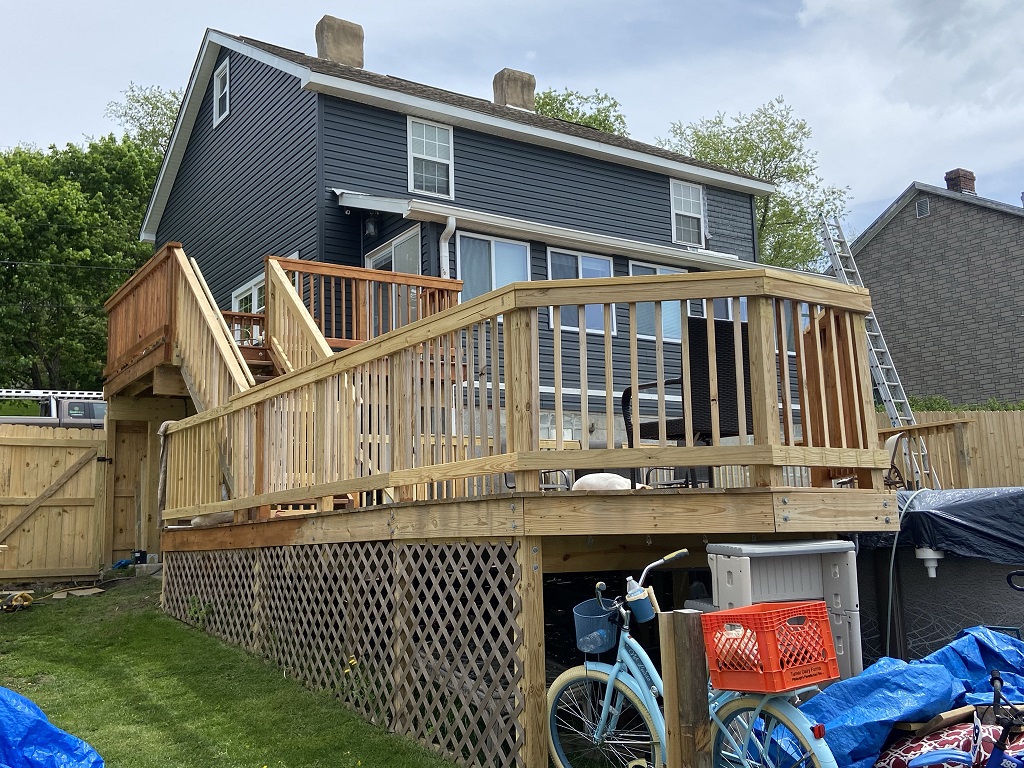 Custom wood deck build for summer fun!   